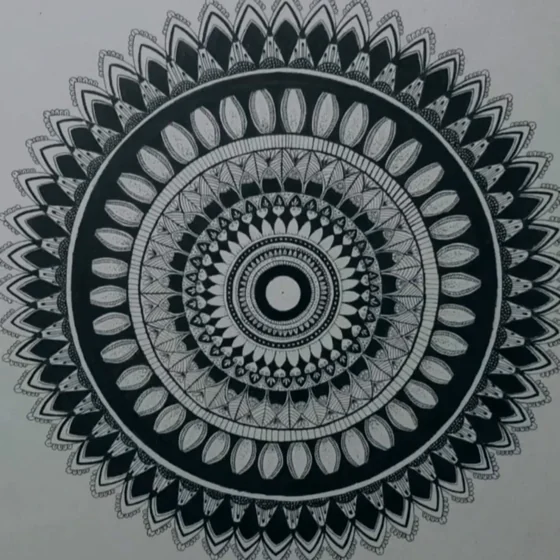 Hand-drawn mandala built from concentric rings of petals and geometric line work.